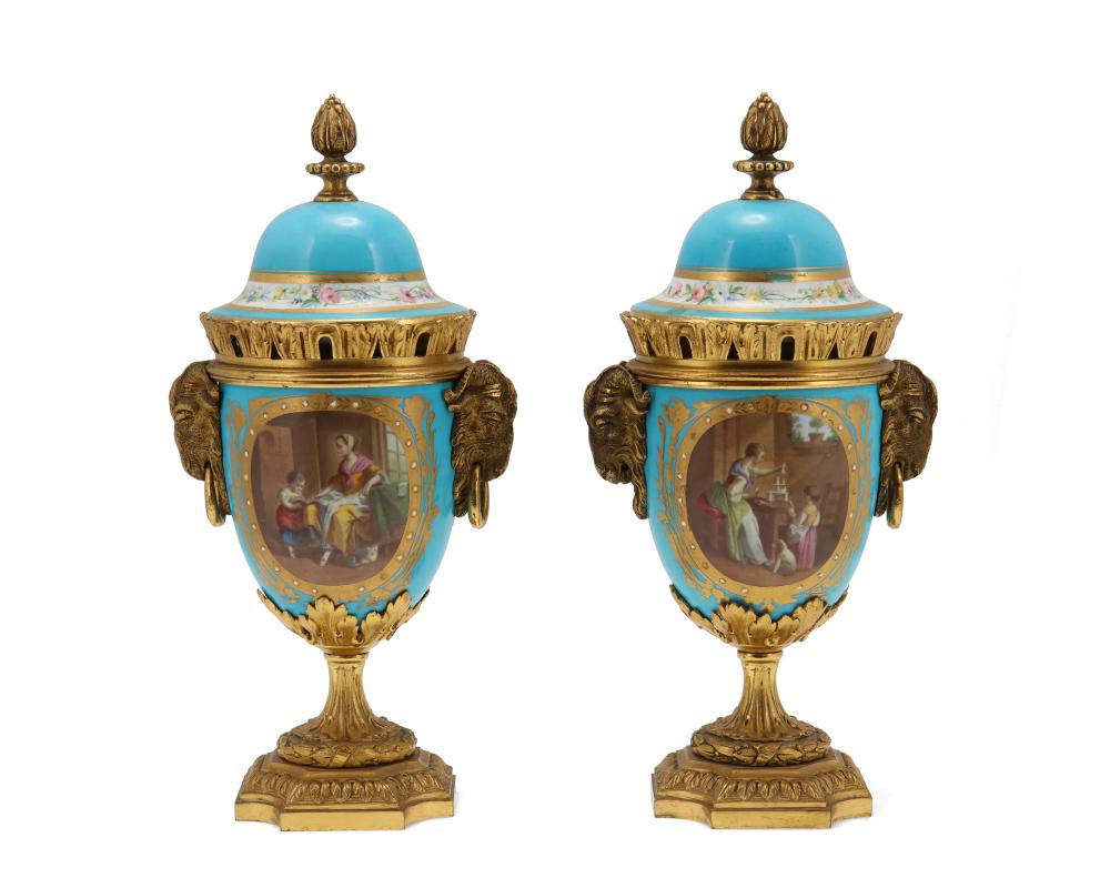 Appraisal: A pair of Sevr s-style urns Late th early th