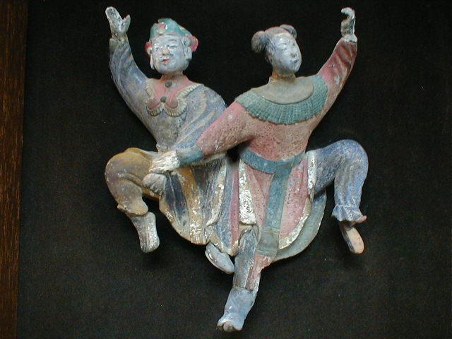 Appraisal: A Chinese polychrome group of male and female figures mounted