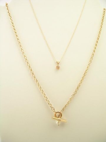 Appraisal: Two yellow gold necklaces including K yellow gold with K