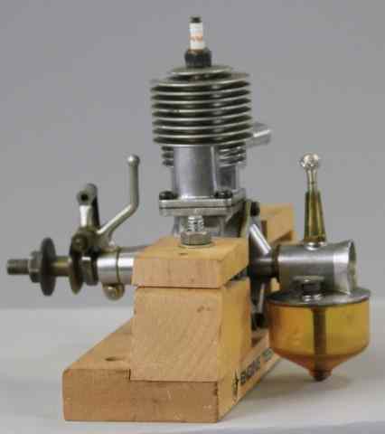 Appraisal: ROCKET MOTOR Mounted with stand includes spark plug fuel bowl