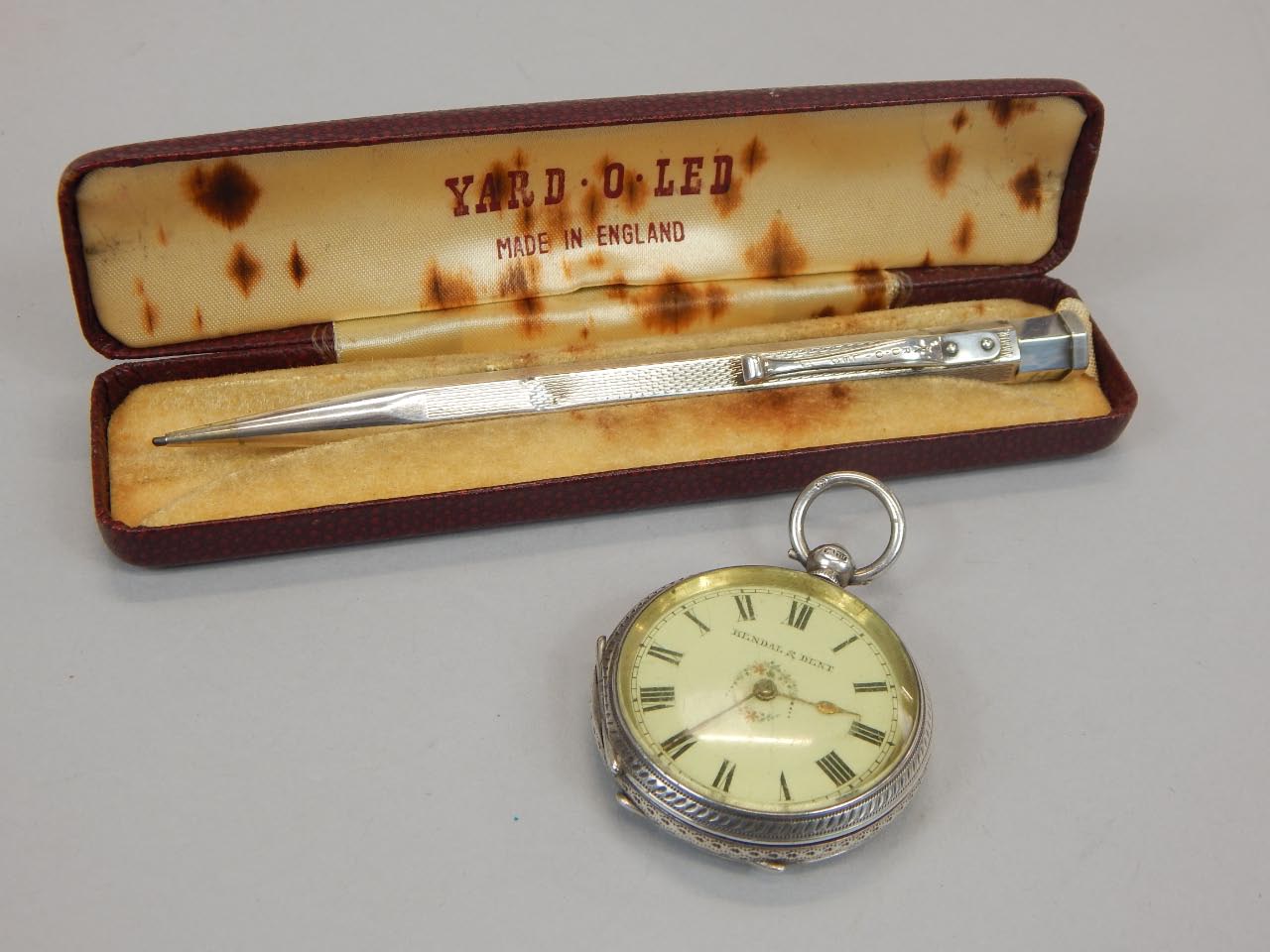 Appraisal: Two trinket items to include a silver fob watch and