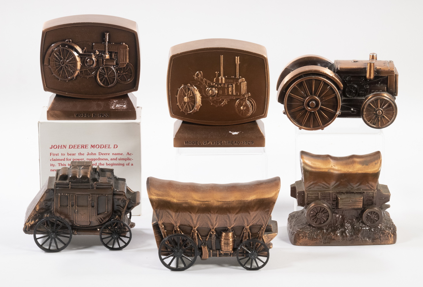 Appraisal: COVERED WAGON TRACTOR FORM STILL BANKS All in copper finish