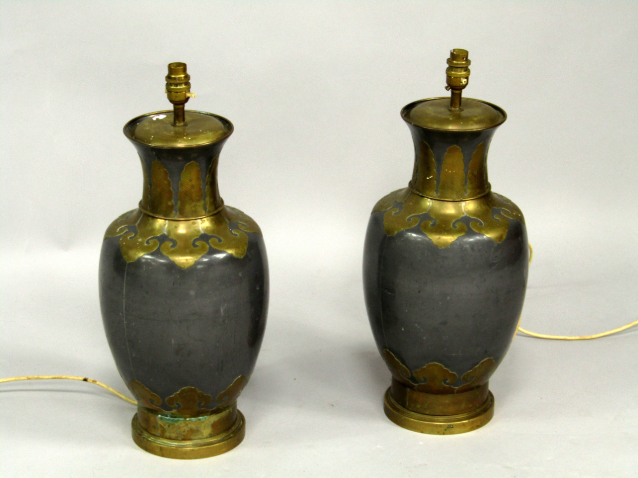 Appraisal: A pair of metal damascene style table lamps of baluster