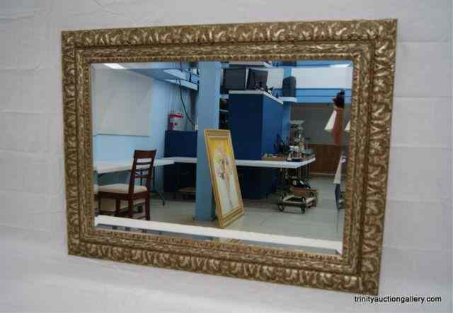 Appraisal: Antiqued Gold Tone Beveled Glass Wall Mirror This is for