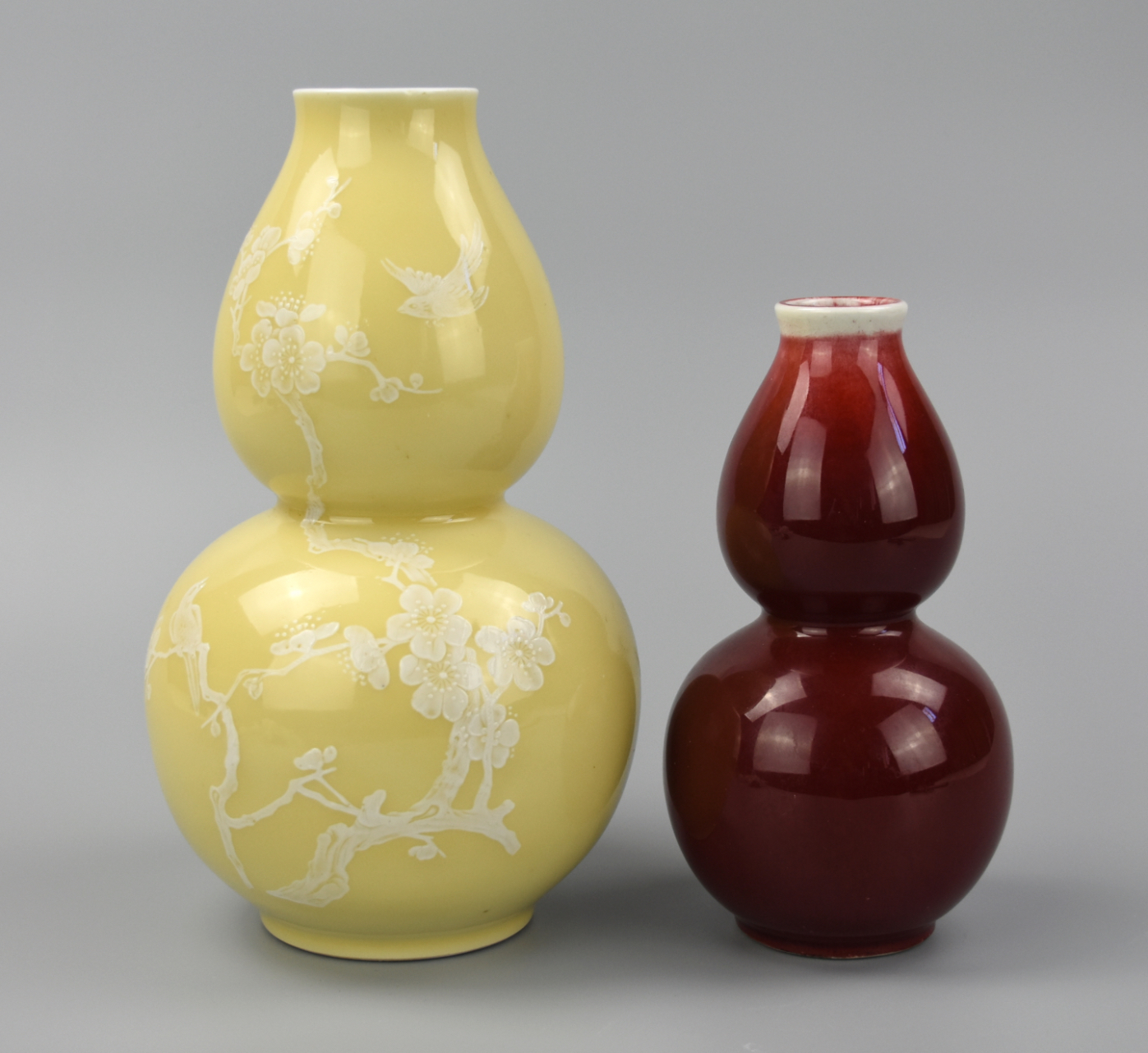 Appraisal: CHINESE GOURD VASES YELLOW RED GLAZE S A pair of