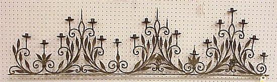 Appraisal: Wrought iron candle rack scrolled vine motif l