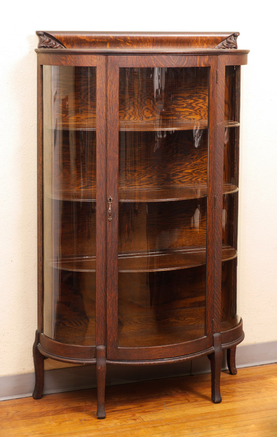 Appraisal: DIMINUTIVE TRIPLE BOW FRONT OAK DISPLAY CABINET Top backsplash carved