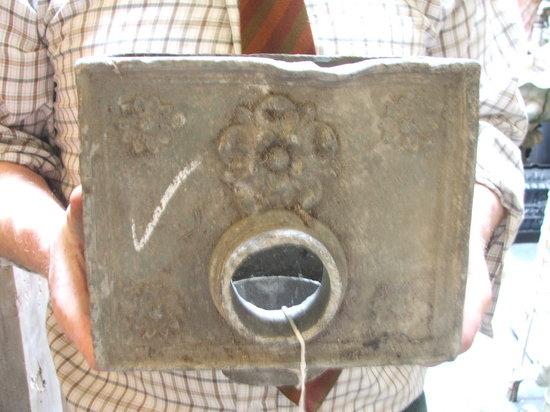 Appraisal: A LEAD HOPPER with rosette decoration wide a lead recumbent