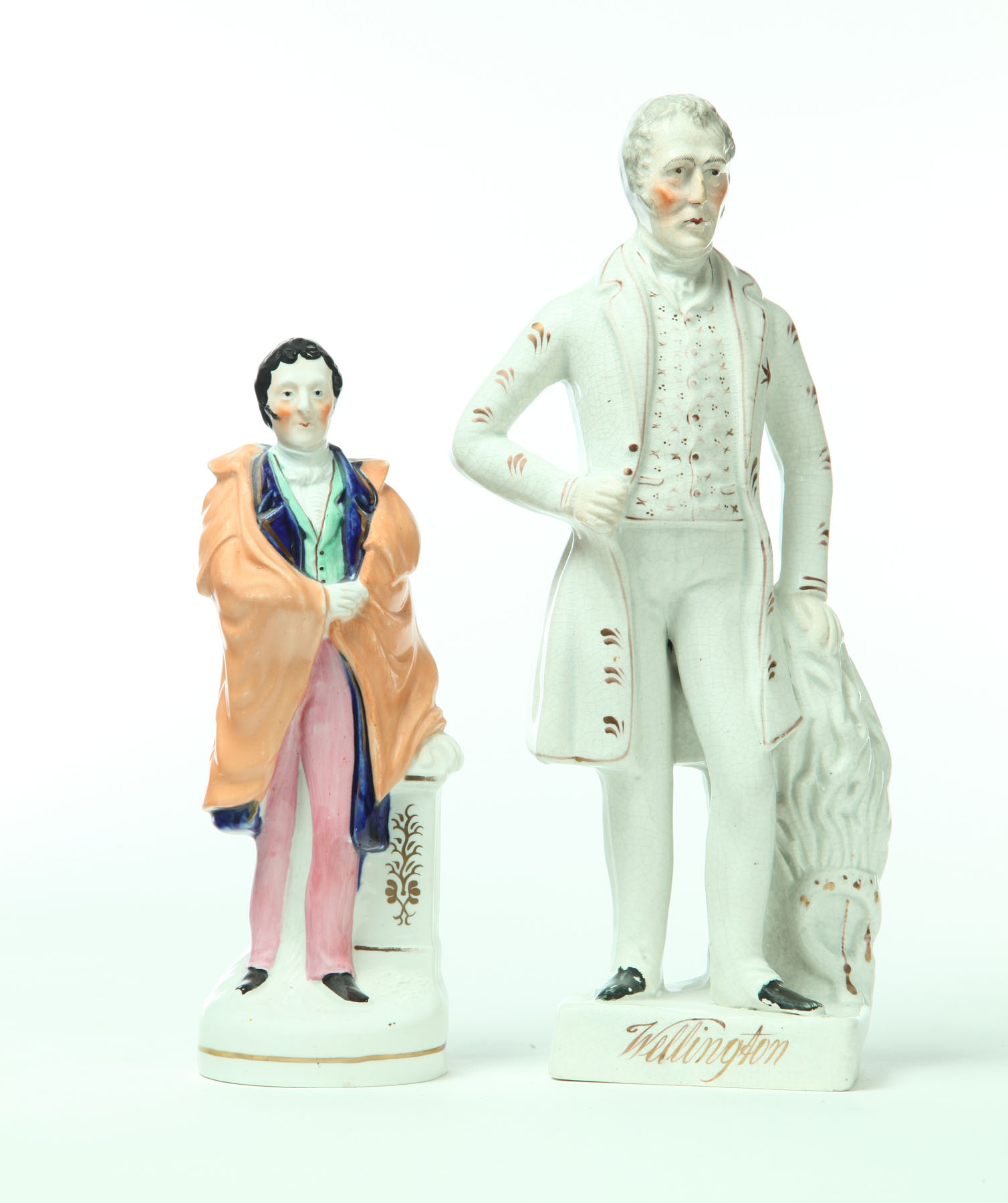 Appraisal: TWO STAFFORDSHIRE FIGURES OF THE DUKE OF WELLINGTON England mid