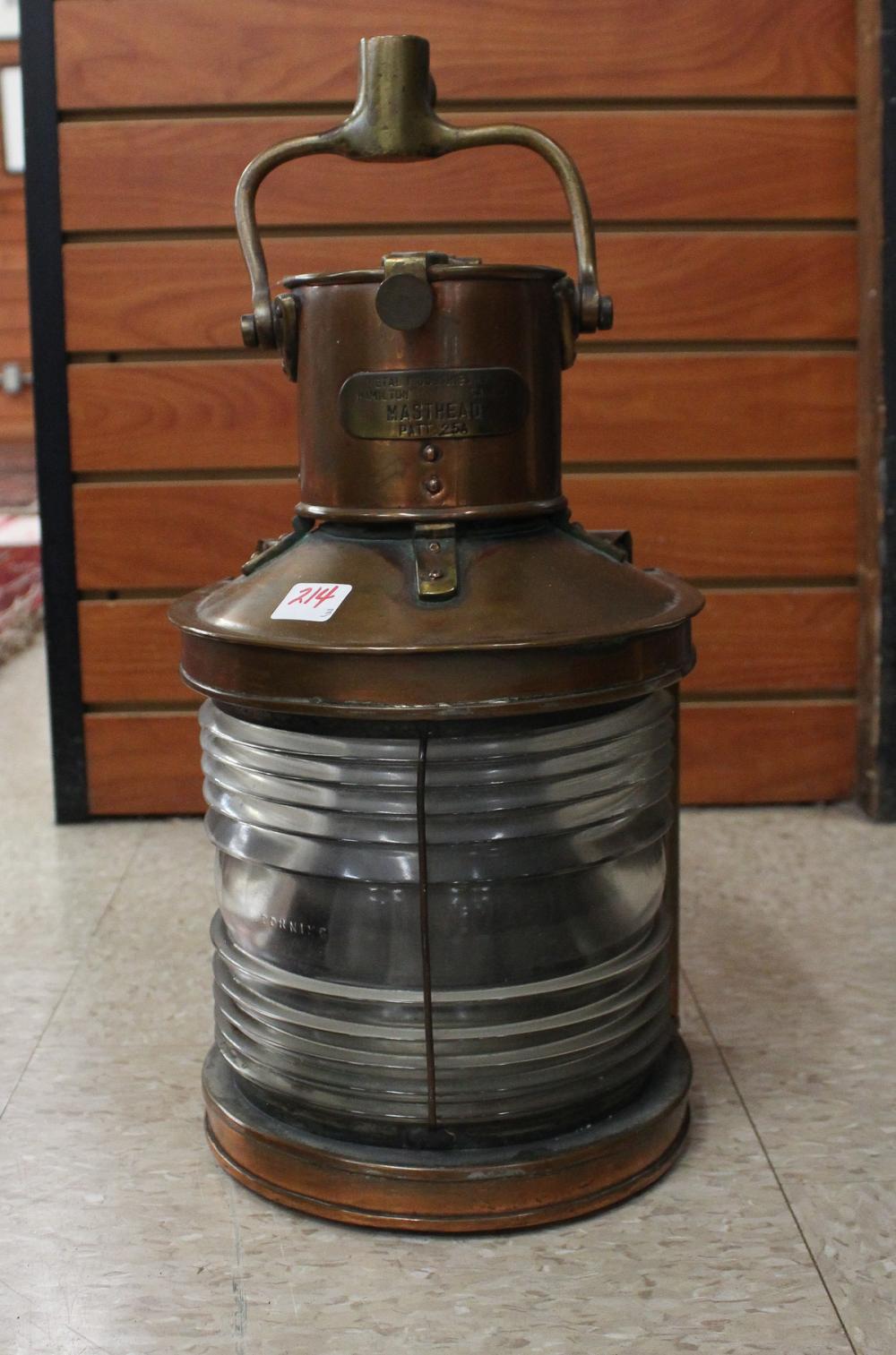 Appraisal: COPPER MARITIME LANTERN SHIP'S CLOCK AND A ROUND BAROMETER copper