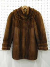 Appraisal: A mink coat medium sized with wear to lining and