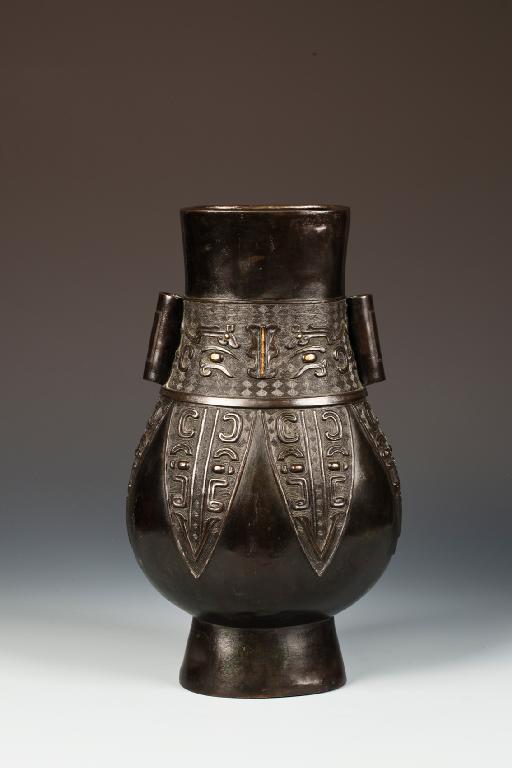 Appraisal: A CHINESE BRONZE GOLD INLAID HU VASE of archaistic form