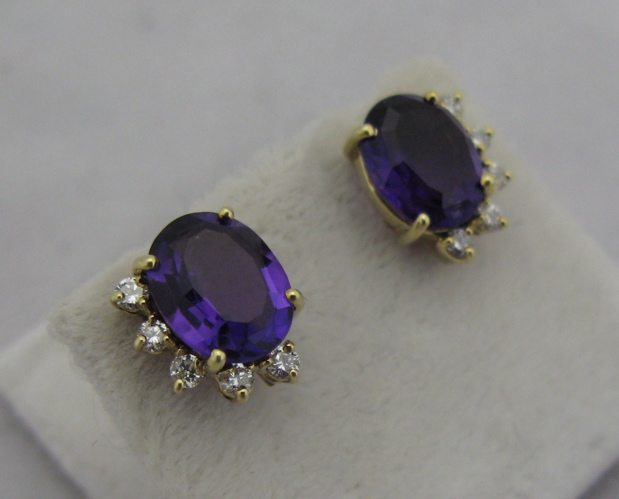 Appraisal: PAIR OF AMETHYST DIAMOND AND KARAT GOLD EARRINGS each is