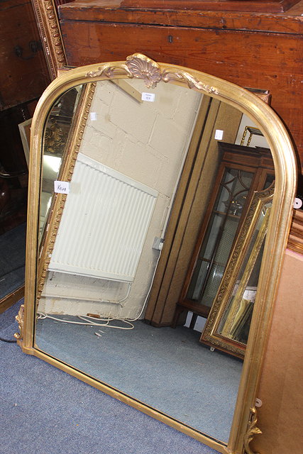 Appraisal: A GILT FRAMED OVERMANTLE MIRROR with a scallop shell crest