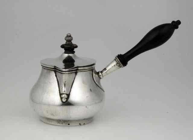 Appraisal: An Indian-colonial silver brandy warmer Lattey Brothers Co Calcutta circa