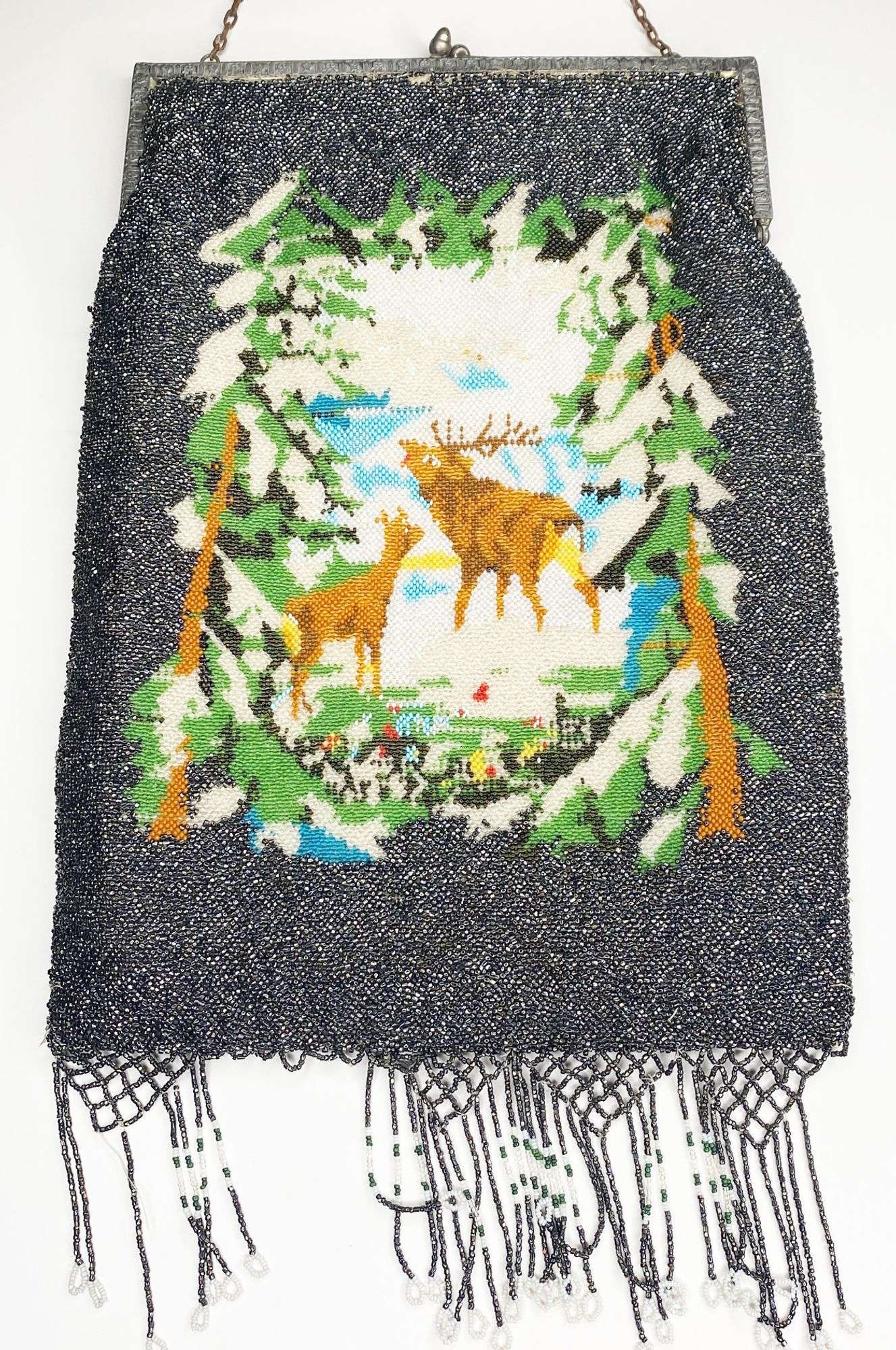 Appraisal: Large Micro Beaded Purse with Stag in Winter Scene long