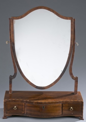 Appraisal: Shield-Form Shaving Mirror Mahogany Inlaid rim three-drawer center with key