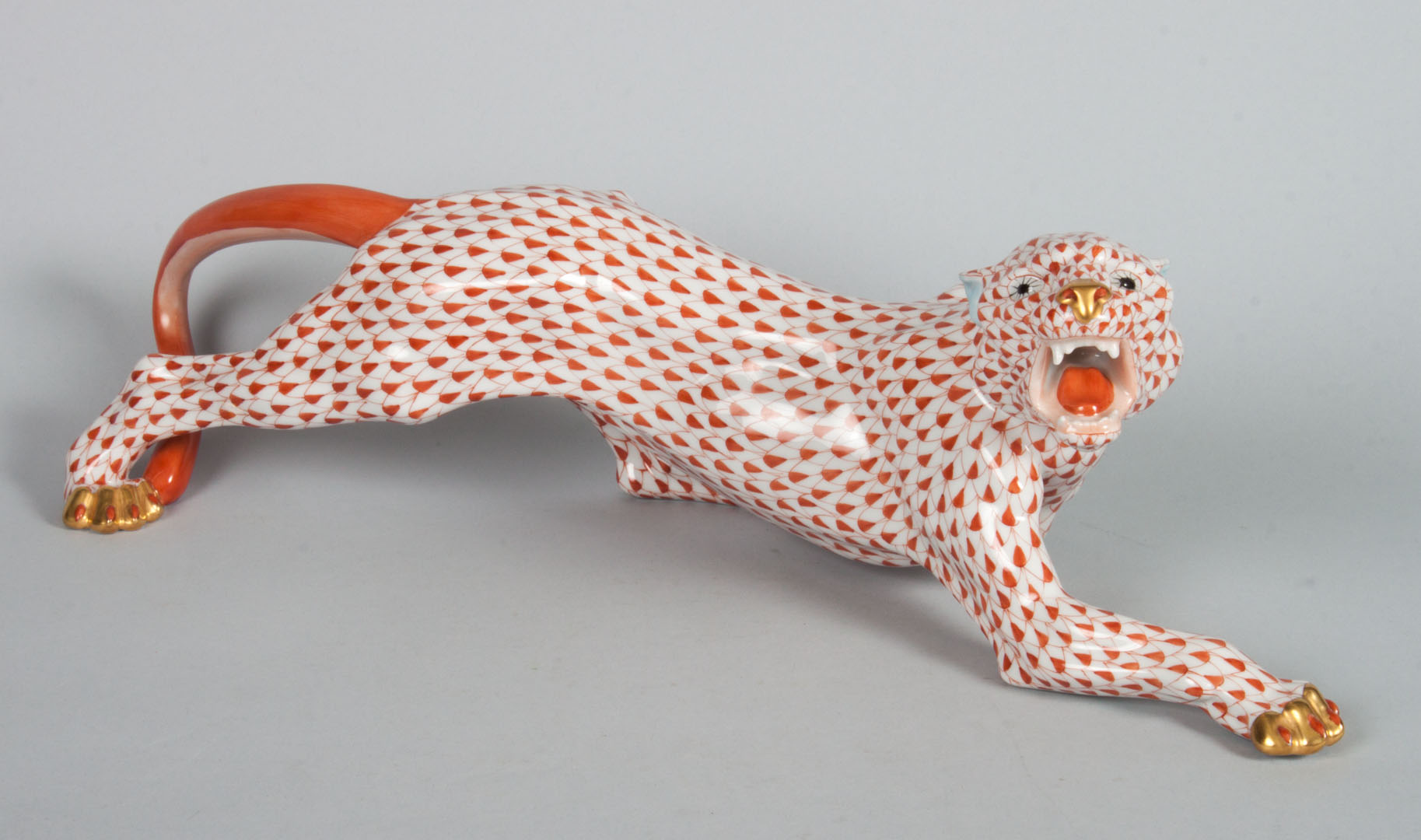 Appraisal: Herend porcelain prowling panther in the Rust Fishnet pattern in