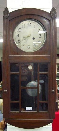 Appraisal: A 's walnut wall clock with glazed door fitted an