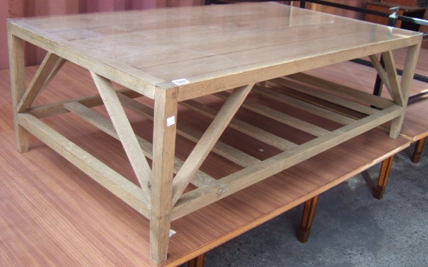 Appraisal: A th century oak coffee table the plank top over