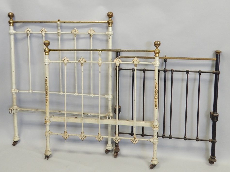 Appraisal: A cream painted and brass Victorian single bed and one