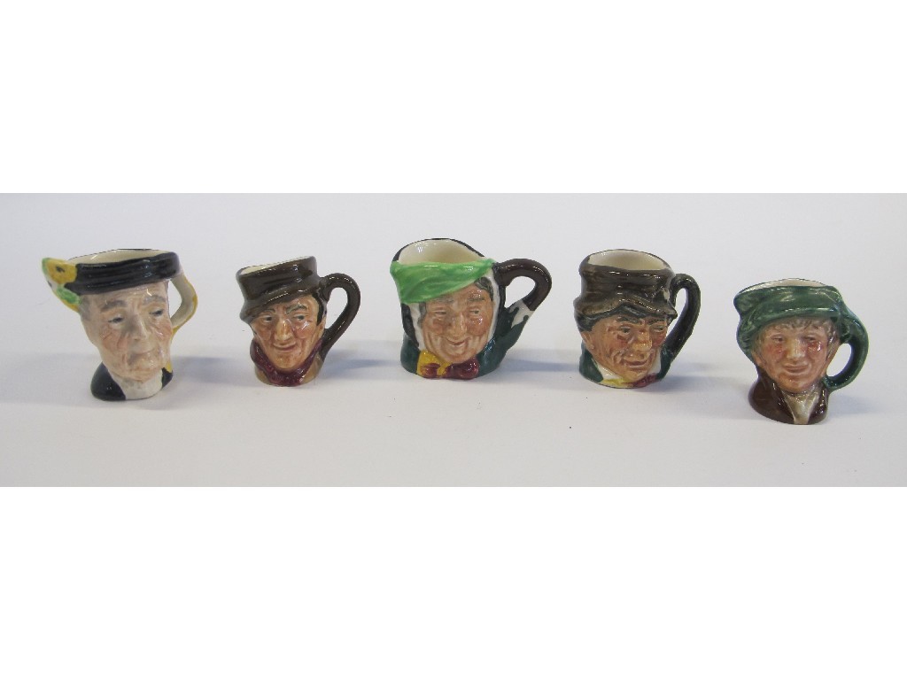 Appraisal: Four Royal Doulton tiny character jugs and one other