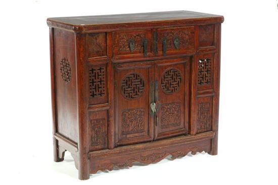 Appraisal: SIDE CABINET China th century elm Two drawers over two