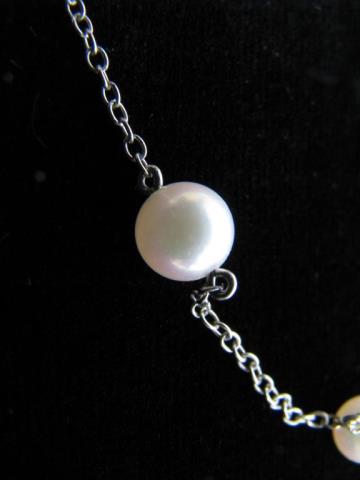 Appraisal: A Mikimoto K white gold pearl station necklace long -