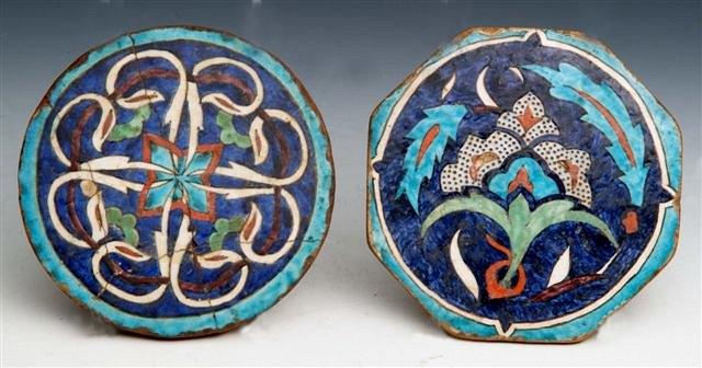 Appraisal: A PAIR OF TURKISH KUTAHYA POLYCHROME TILES one circular one