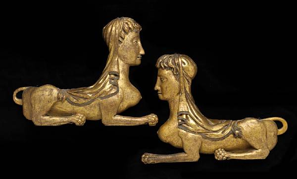 Appraisal: A pair of Italian carved giltwood sphinx appliques th century