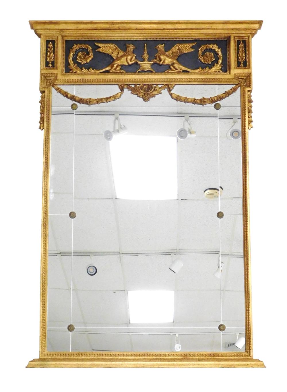 Appraisal: Wall mirror Federal style with griffins in tablet bellflower and