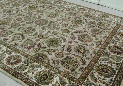 Appraisal: HAND KNOTTED ORIENTAL CARPET Indo-Persian overall floral arabesque decoration on