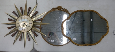 Appraisal: Two Ornate brass edged wall mirrors together with Metamec starburst