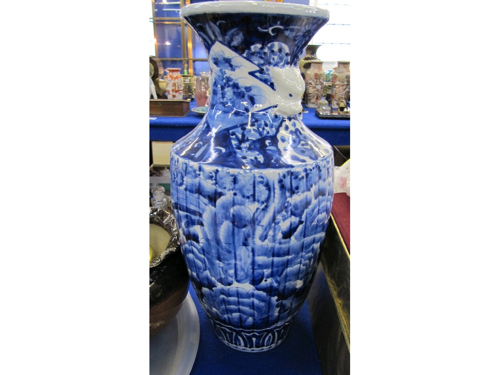 Appraisal: Large oriental blue and white vase with dragon head handles