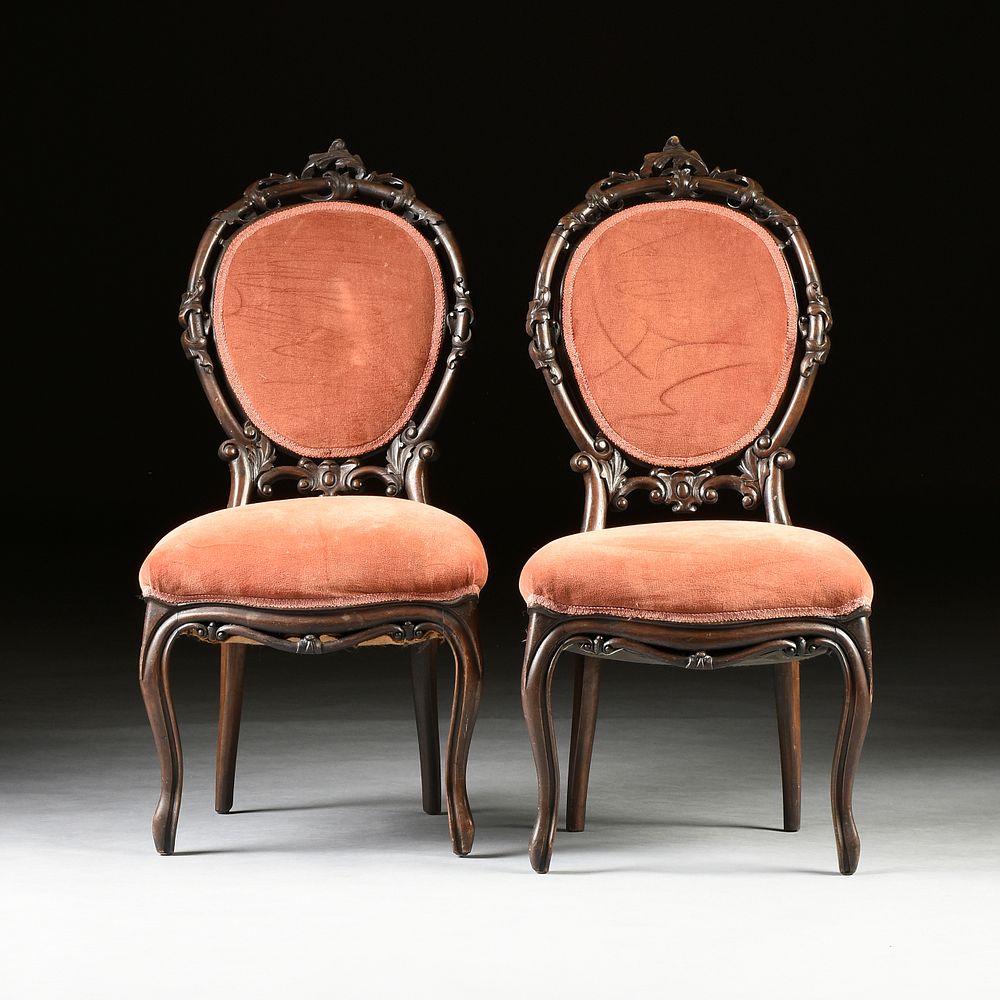 Appraisal: A PAIR OF VICTORIAN VELVET UPHOLSTERED ROSEWOOD SALON CHAIRS AMERICAN