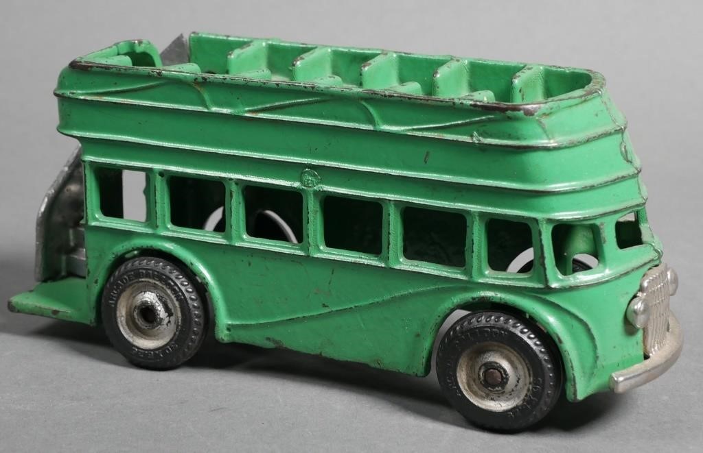 Appraisal: Arcade cast iron green double decker bus Bus measures approx