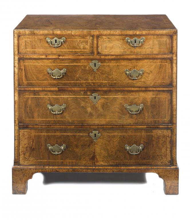 Appraisal: A GEORGE I WALNUT AND FEATHERBANDED CHEST OF DRAWERS the