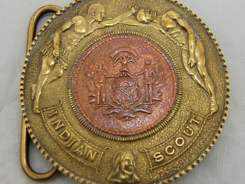 Appraisal: Tiffany bronze circular belt buckle cast for 'Indian Scout' stamps