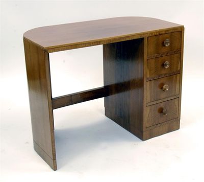 Appraisal: A Bowman Brothers walnut veneered desk curved back the front