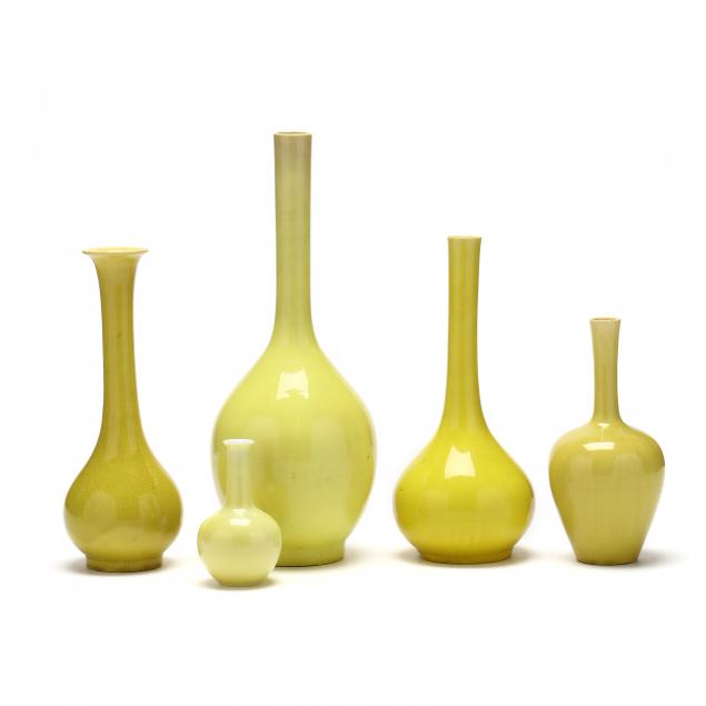 Appraisal: FIVE CHINESE MONOCHROME YELLOW VASES th century porcelain with egg