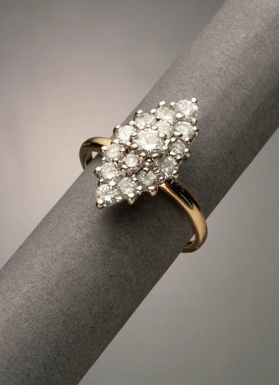 Appraisal: -Karat Yellow and White-Gold and Diamond Cluster Ring The marquise-shape