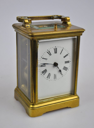 Appraisal: A late th century lacquered brass carriage clock the twin