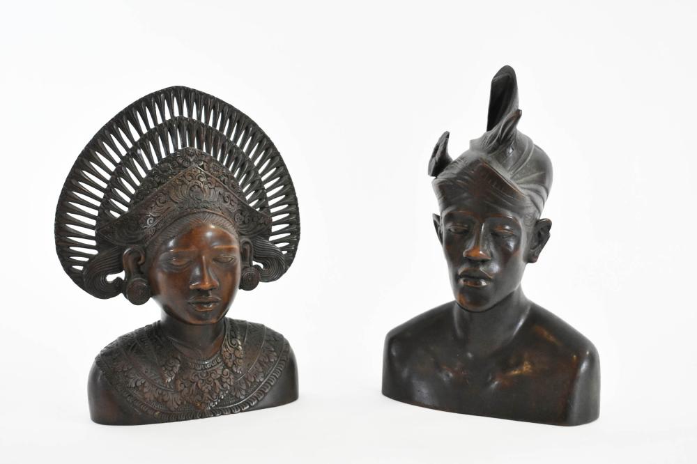 Appraisal: PAIR OF INDONESIAN WOOD BUSTS OF A MALE AND FEMALEModern