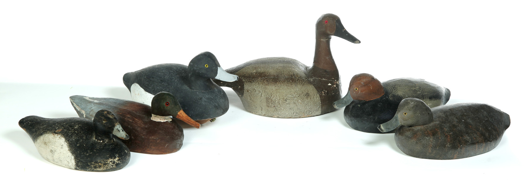 Appraisal: SIX DUCK DECOYS WITH OLD PAINT AND GLASS EYES American