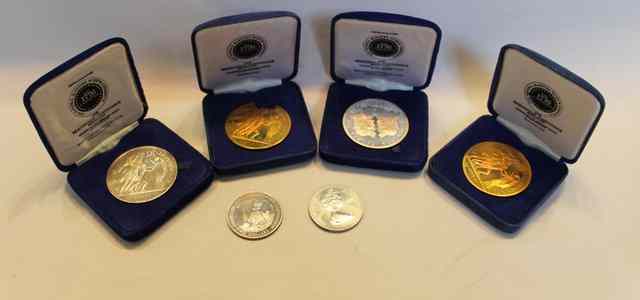 Appraisal: A COLLECTION OF SIX CASED COMMEMORATIVE MEDALLIONS including two American