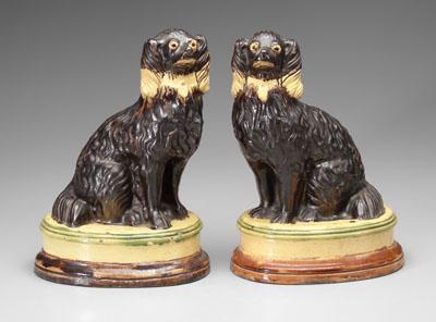 Appraisal: Pair Staffordshire spaniels dark brown black glaze on yellow ground