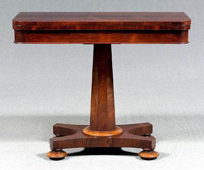 Appraisal: Classical rosewood games table rosewood veneer overall fold-over top of