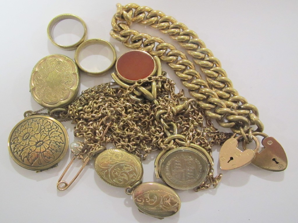 Appraisal: Lot comprising yellow metal guard chain with two revolving fobs