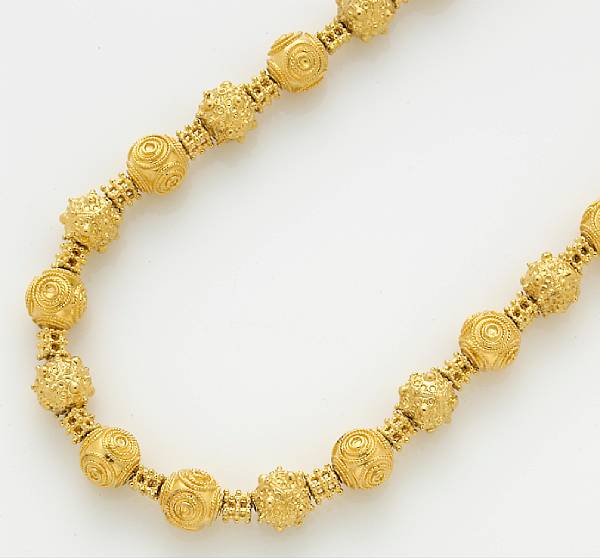 Appraisal: A fourteen karat gold bead necklace weighing approximately grams length