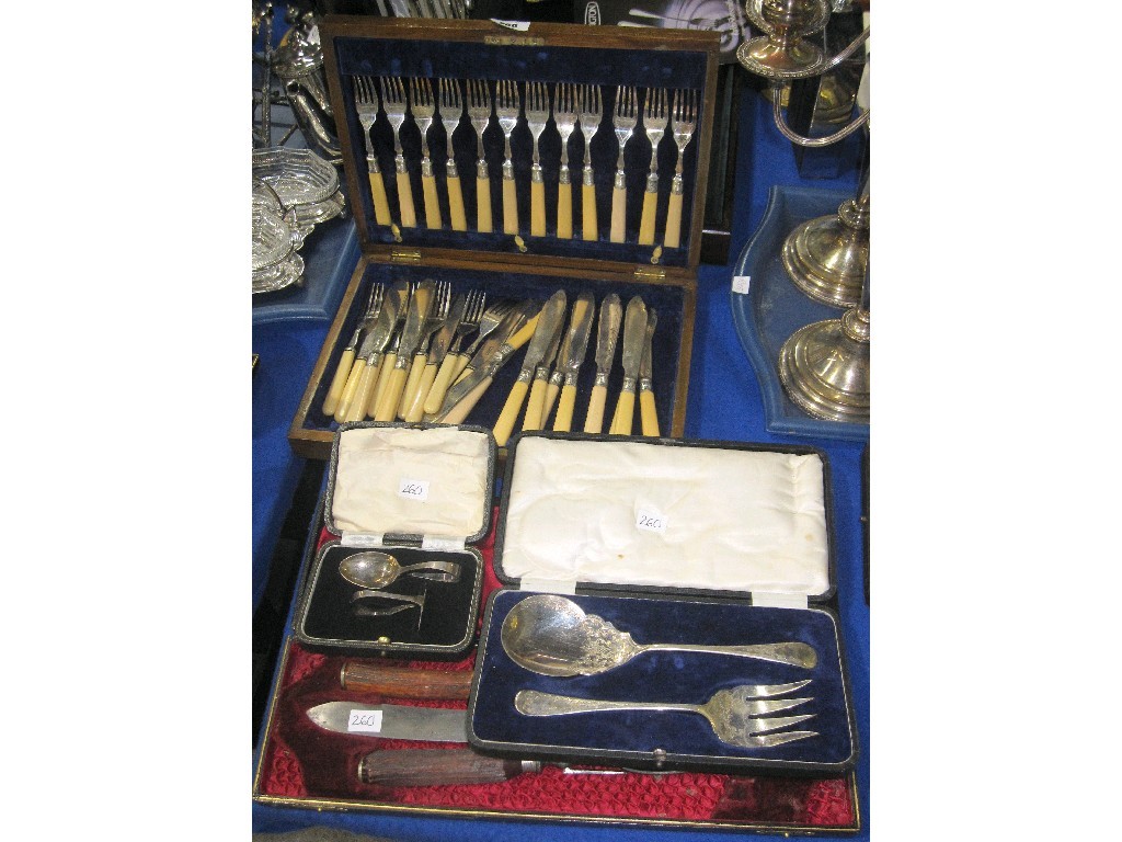 Appraisal: Lot comprising part fish cutlery set cake servers carving set